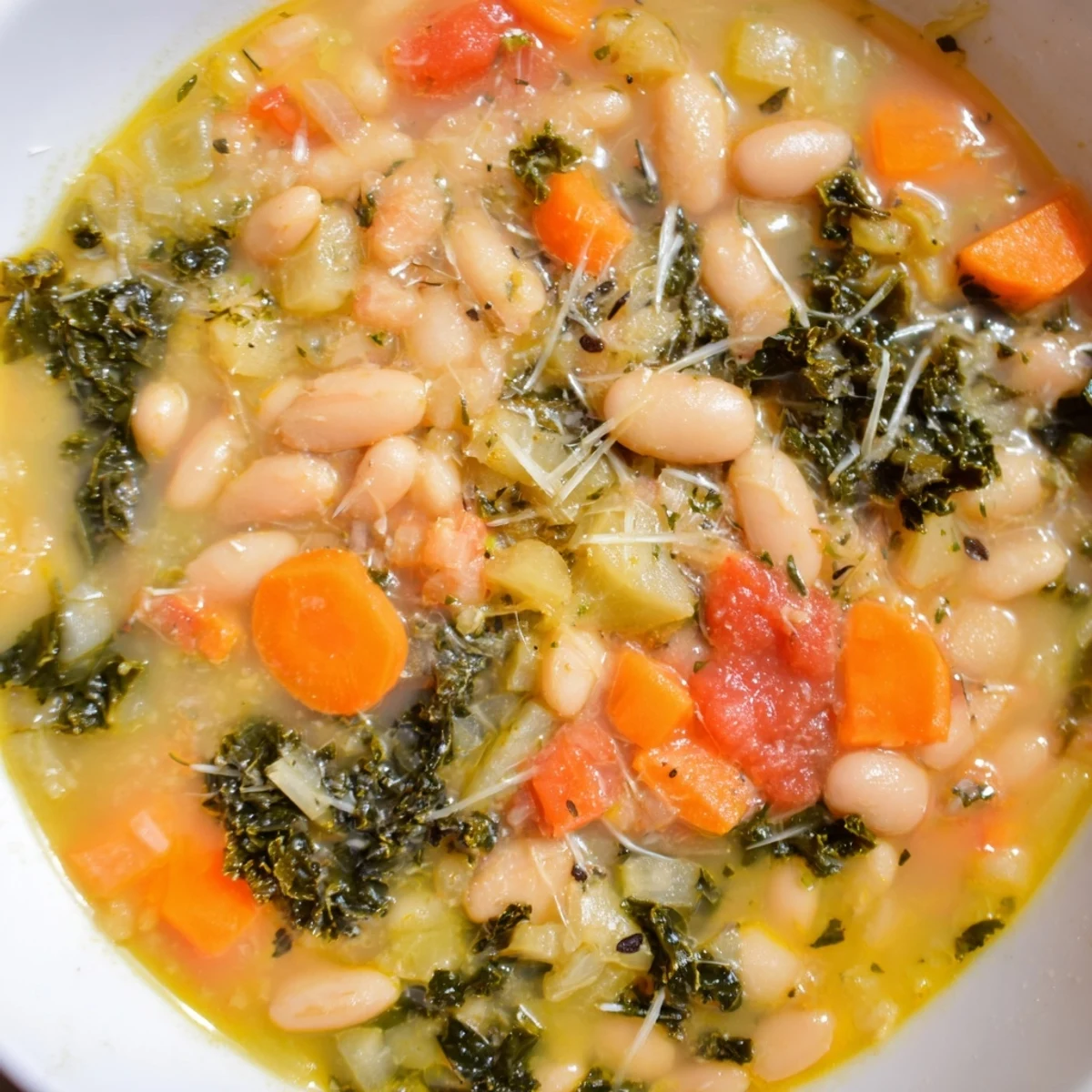 Hearty Tuscan White Bean Soup served with crusty bread, perfect for cozy evenings.