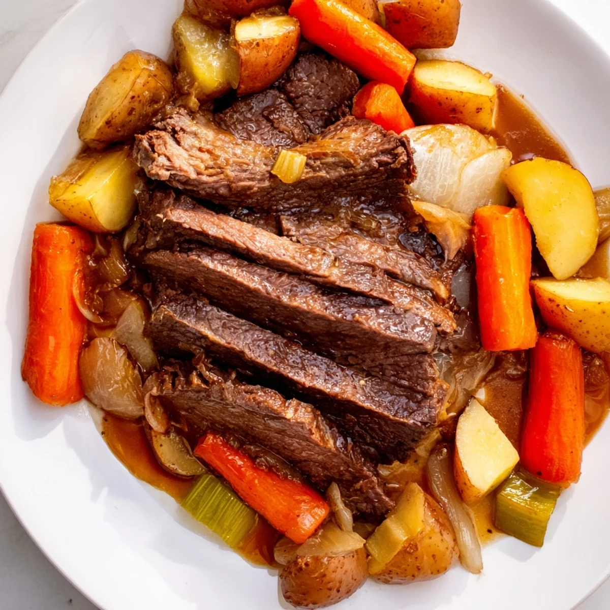 A close-up image shows a flavorful Sunday Pot Roast with a rich sauce and savory aroma.
