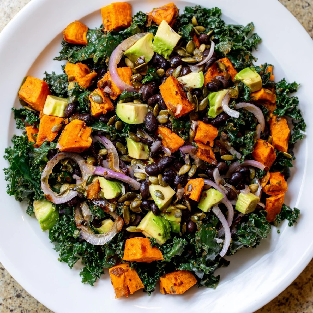 Bright and flavorful massaged kale salad ready to serve, perfect for a healthy lunch.