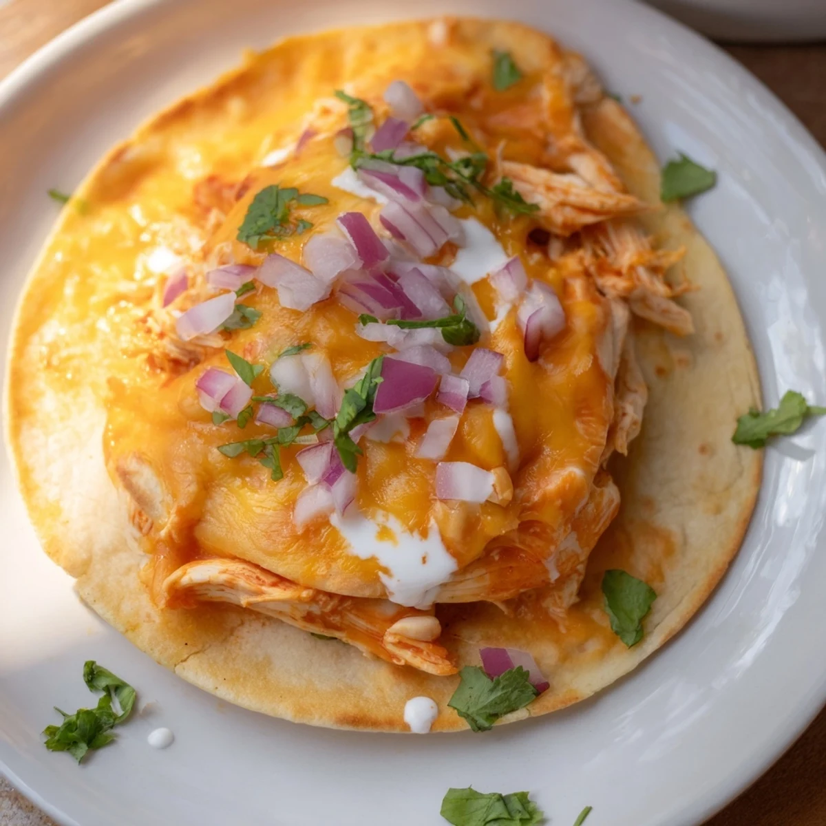 Enjoy this easy Buffalo Chicken Quesadilla, filled with chicken, cheese, and folded in a crispy tortilla.