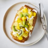 Delicious yogurt-custard toast with fresh kiwi, mango, and pineapple slices.  