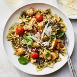 Creamy basil sauce envelops tender chicken and bowtie pasta for a flavorful meal.  