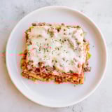 Savor the rich flavors of Cheesy Beef & Penne Bake, perfect for family gatherings.  