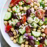 A refreshing bowl of Mediterranean Chickpea Salad, perfect for a light lunch, with bright, fresh ingredients.