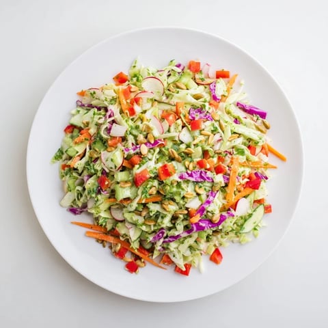 Freshly tossed Green Goddess Confetti Chop Slaw bursting with colorful, crisp vegetables and creamy dressing.