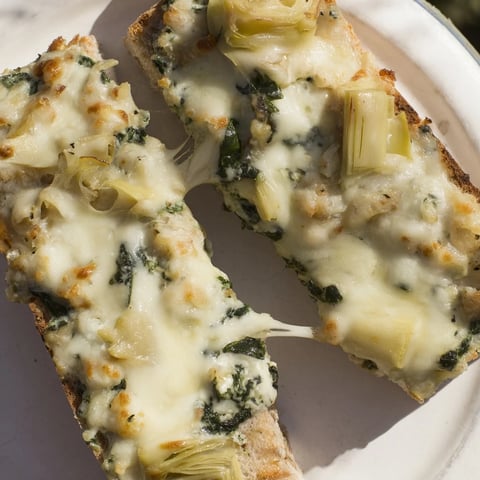 Air Fryer Spinach & Artichoke Dip Grilled Cheese: a melty, golden sandwich, perfect for a comfort food craving.