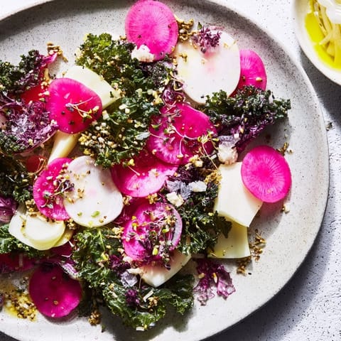 A beautiful, chilled plate of The Tundra Trek, with artfully arranged, thinly sliced daikon and endive.