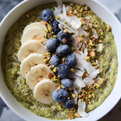 A close-up of a jar of matcha overnight oats, highlighting its rich, earthy flavor and perfect breakfast.