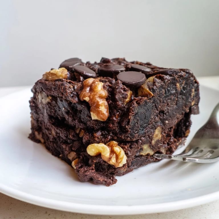 Fudgy brownies made from leftover nut-milk pulp, serve with vegan ice cream.  