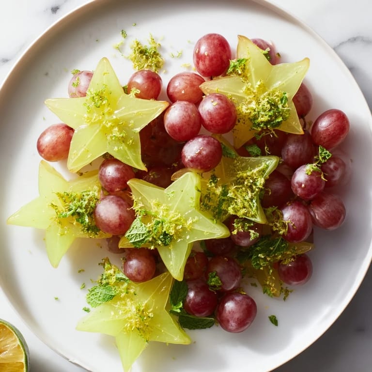 Colorful brunch fruit with starfruit and grapes, easy garnish, ready to brighten any brunch or breakfast plate.
